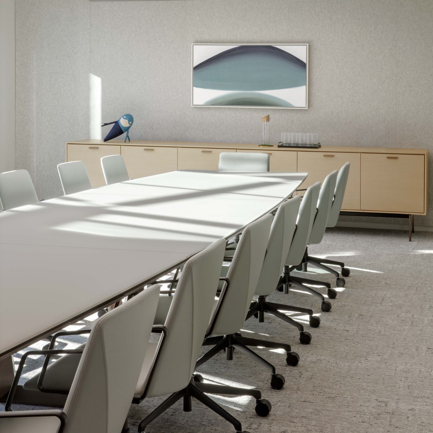 HALO credenza in re-cut oak with deep bronze base and finger pulls complements the  space perfectly.